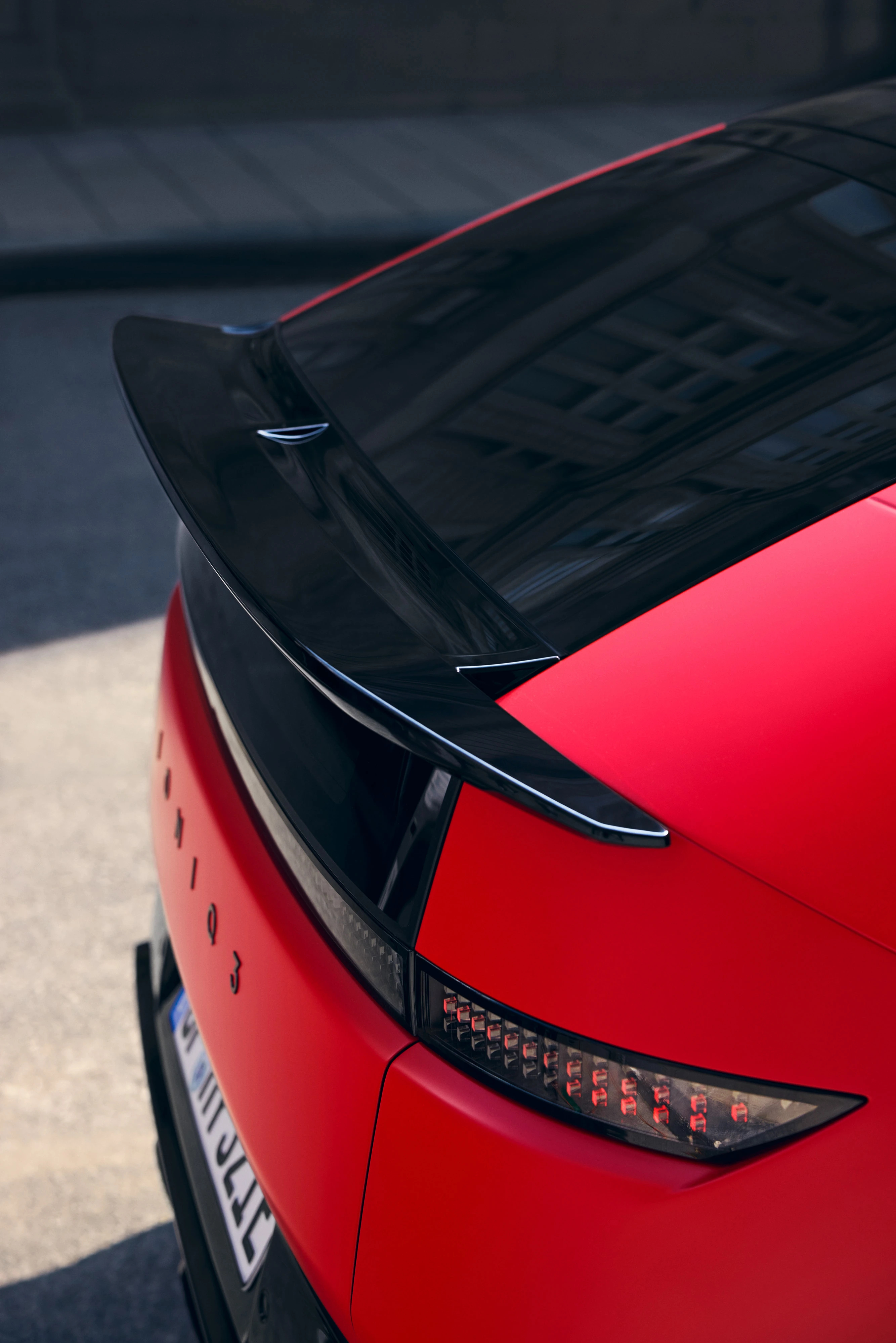 Hyundai IONIQ 3 Exterior Rear Spoiler Closeup 22 Ducktail