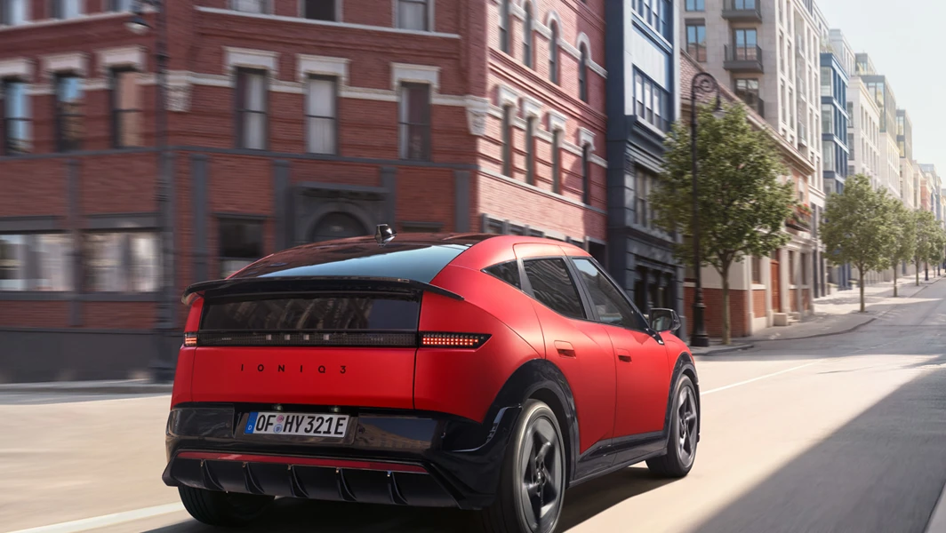 Hyundai IONIQ 3 Exterior 3 4 Rear Driving 1X1