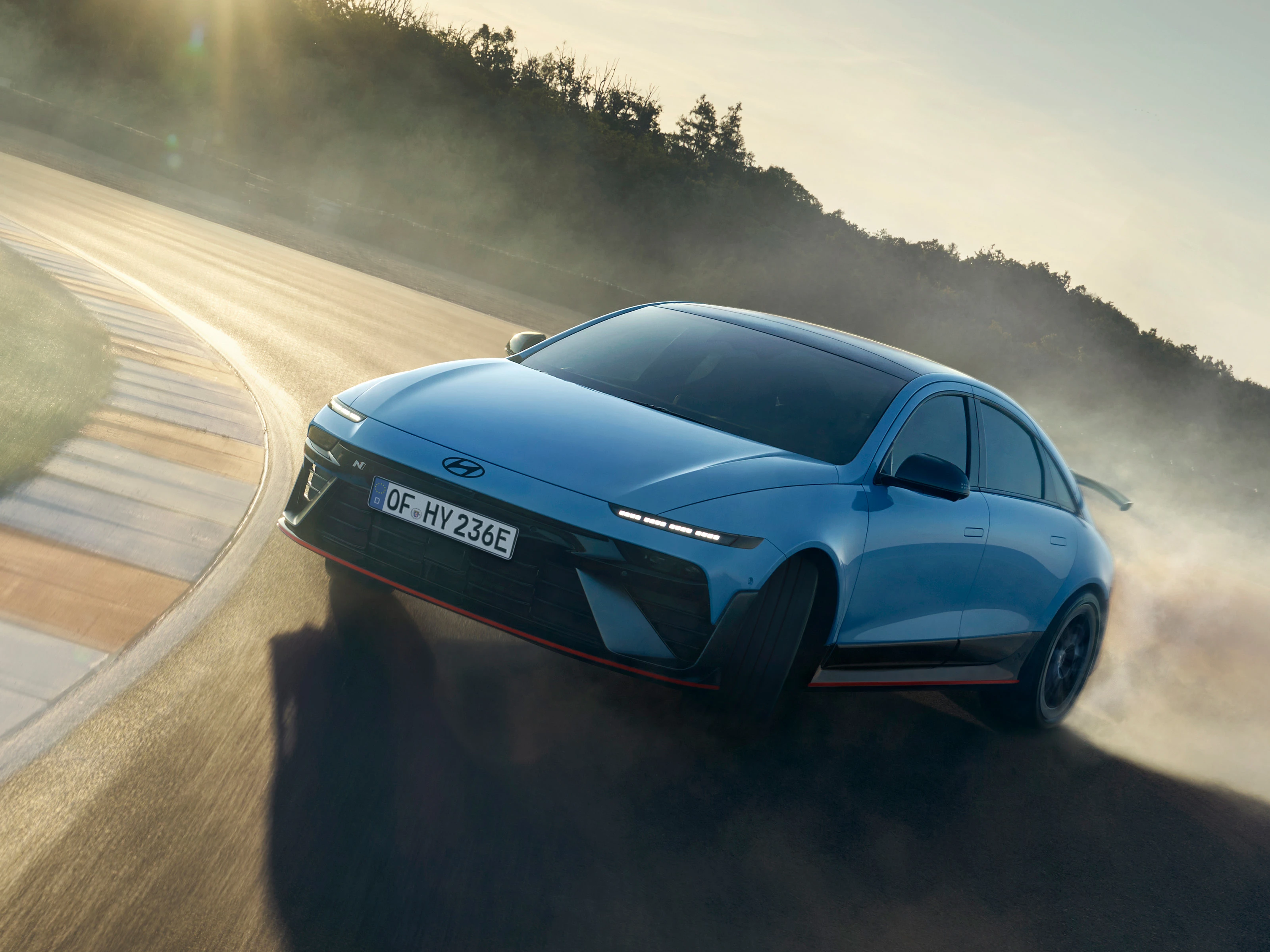 Hyundai IONIQ 6N Exterior Front Quarter Driving 16 IONIQ 6N Driving Front Quarter Drift Optimizer Kopie