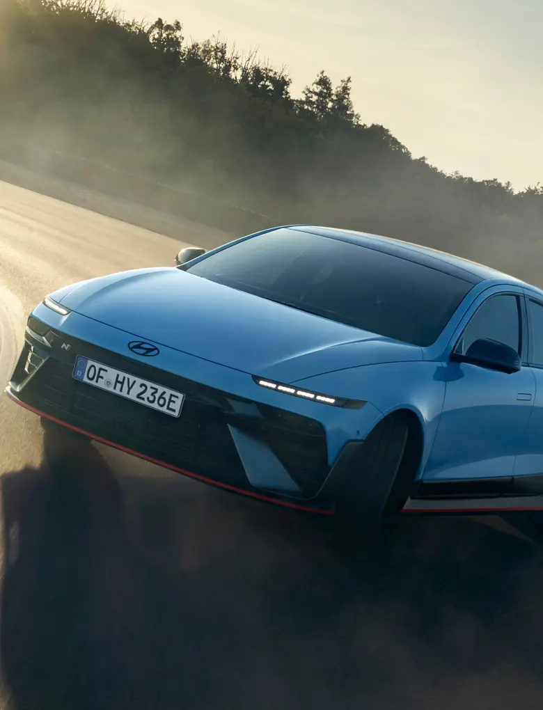 Hyundai IONIQ 6N Exterior Front Quarter Driving 16 IONIQ 6N Driving Front Quarter Drift Optimizer